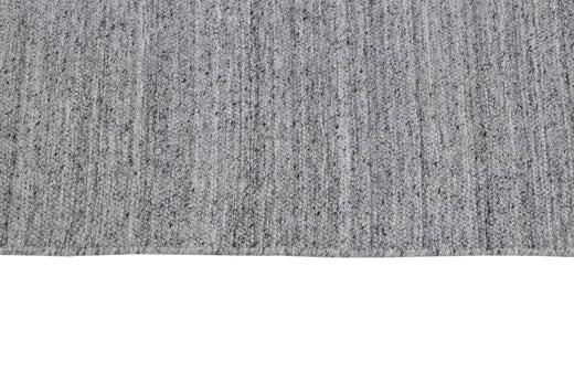 Laagpolig vloerkleed MOMO Rugs Nouveau Plain Light Grey Vloerkledenwinkel