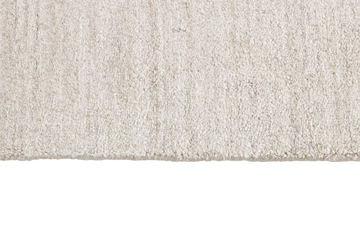 Laagpolig vloerkleed MOMO Rugs Plain Dust Ivory Vloerkledenwinkel